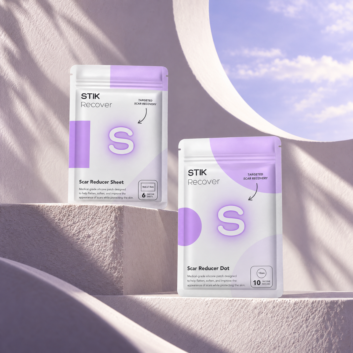 Scar Care Kit pouches on a plinth in soft daylight